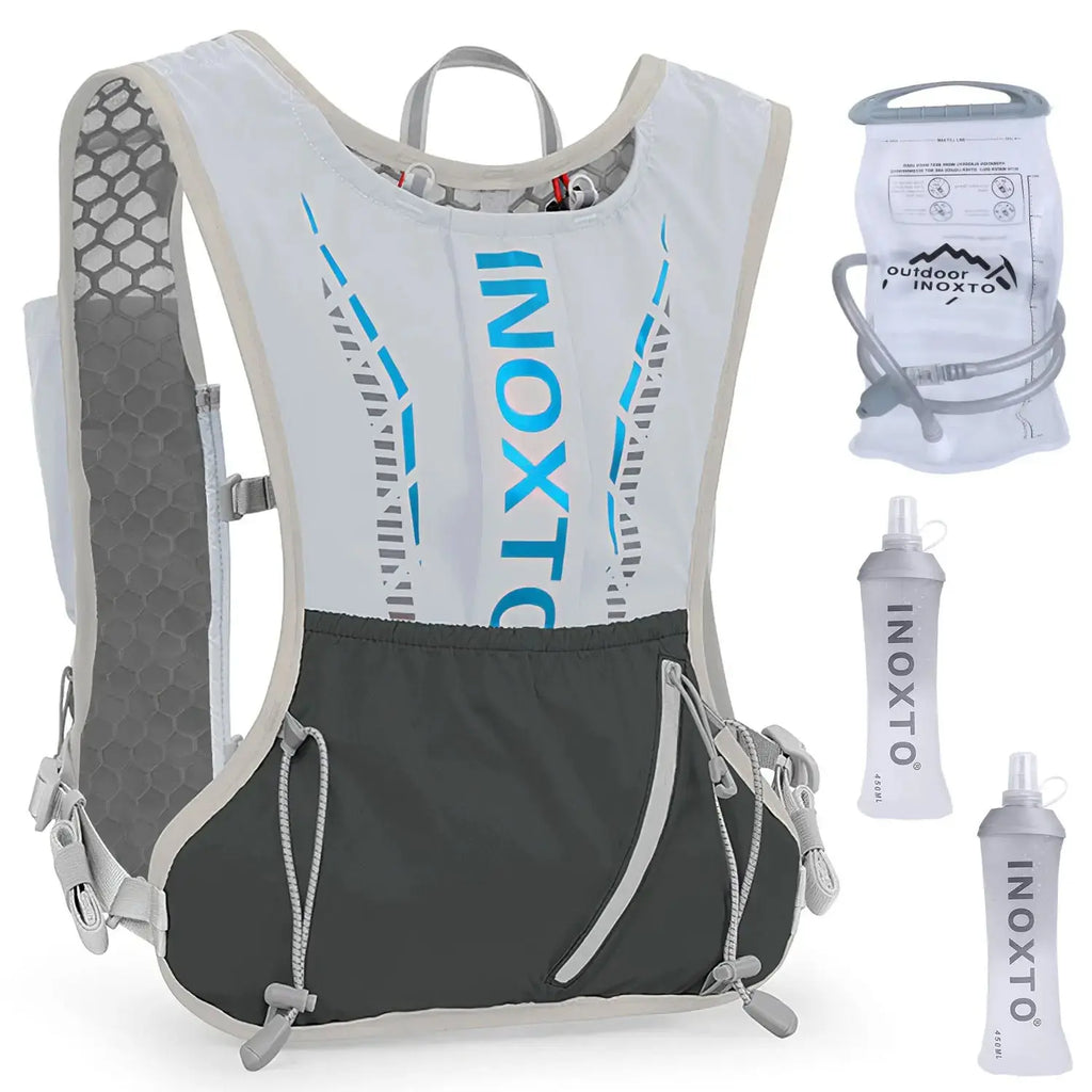 Light grey hydration vest with honeycomb mesh back, front pocket, and adjustable straps