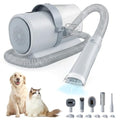 Cordless dog grooming clipper kit with vacuum hose and gray dust-collecting unit