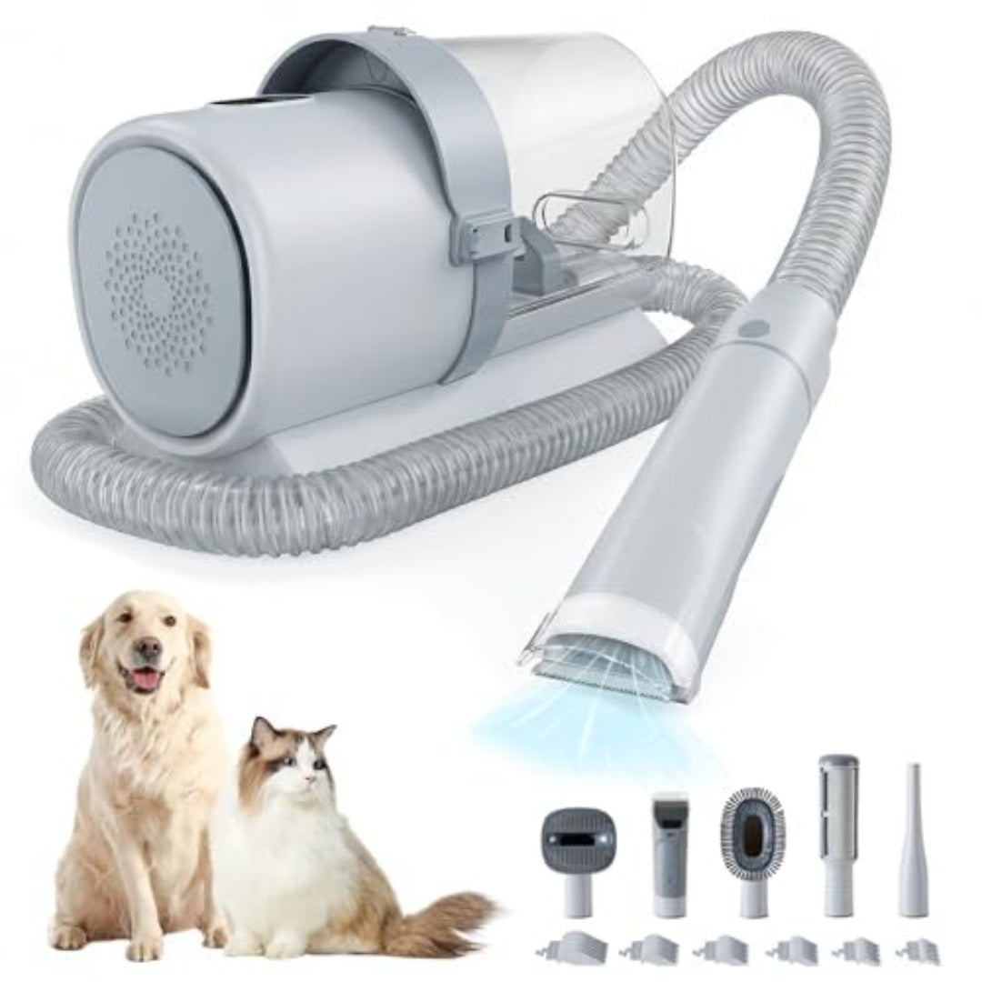 Cordless dog grooming clipper kit with vacuum hose and gray dust-collecting unit