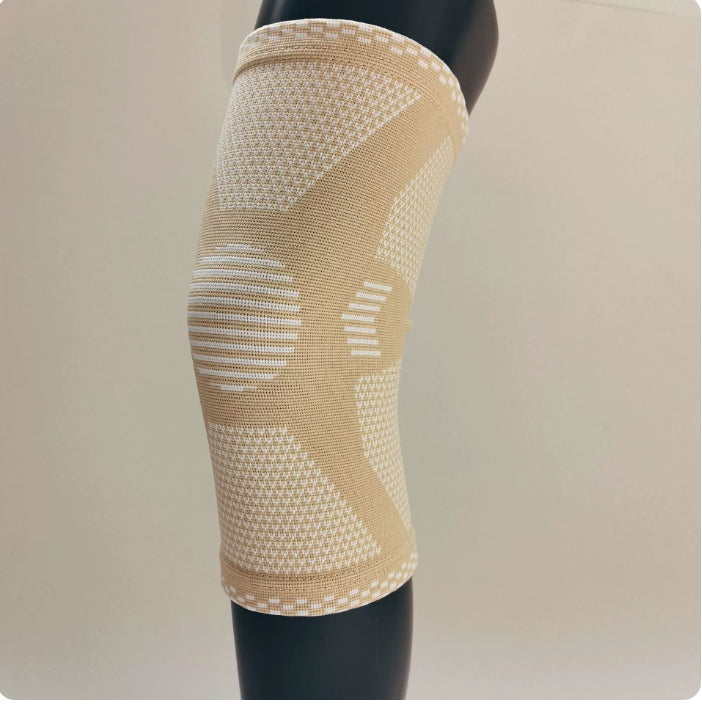 Beige knee compression sleeve with light stripes and textured support panels
