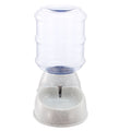 Gravity pet water dispenser with clear barrel, speckled light gray base, and central spout