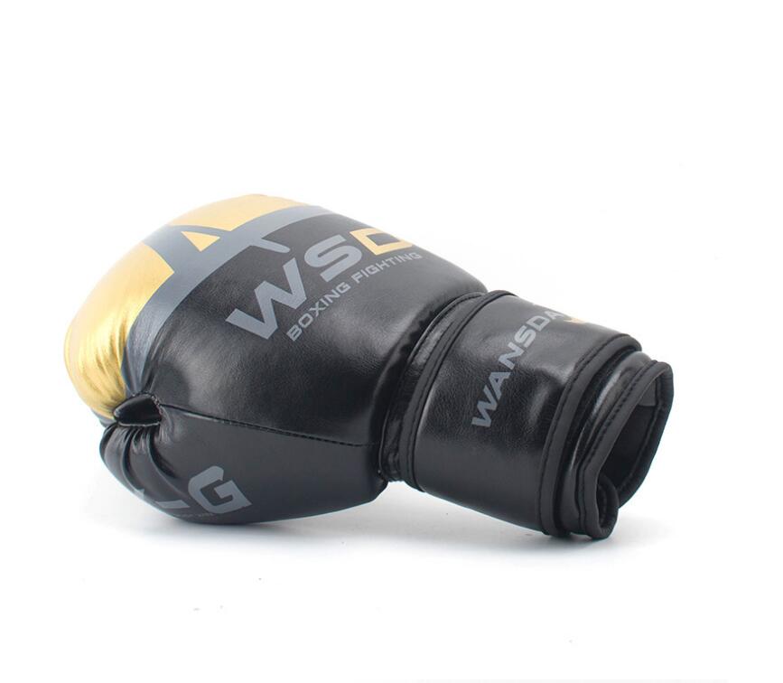 Black and gold boxing gloves with padded knuckles and wrist wrap