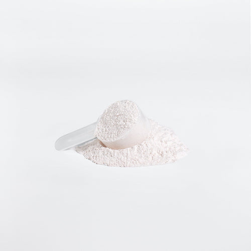 White powder pile with scoop for BCAA Shock Powder, Fruit Punch flavor
