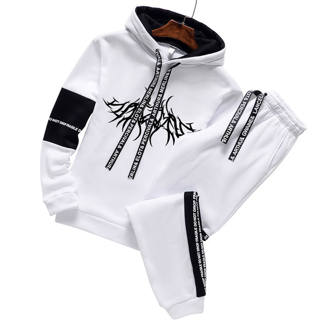 Two-piece hoodie and sweatpants set, white with black graphic print and white joggers