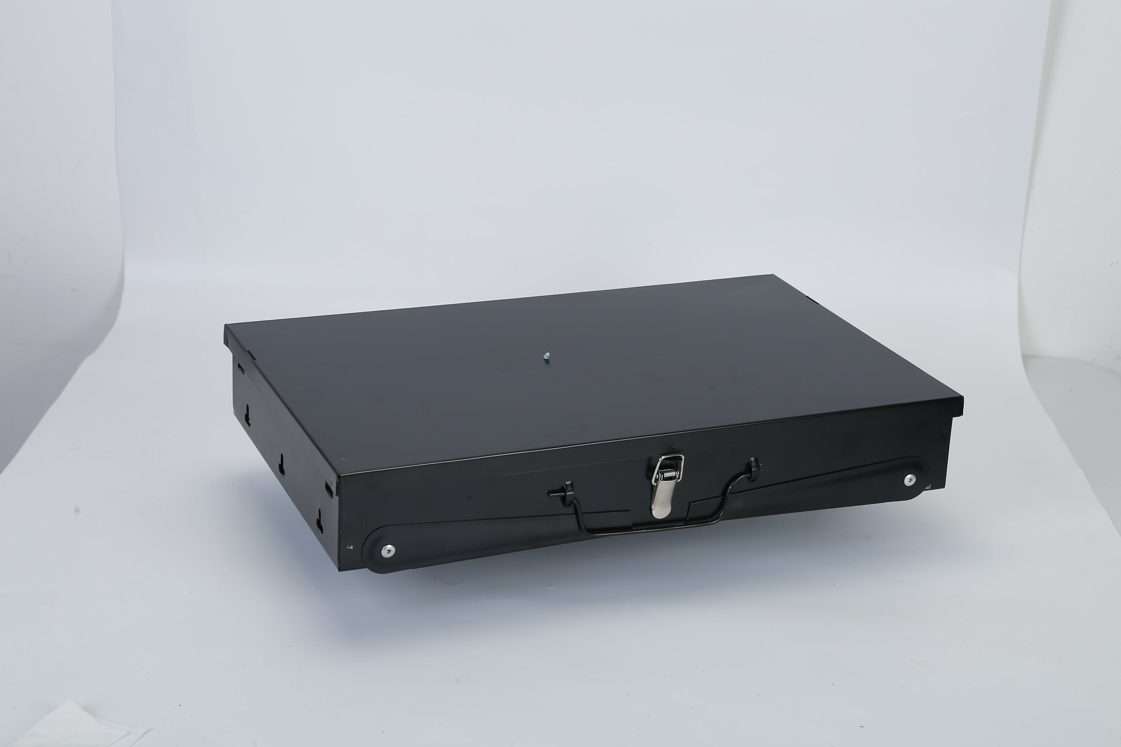 Black foldable BBQ grill base with handle latch, compact rectangular shape
