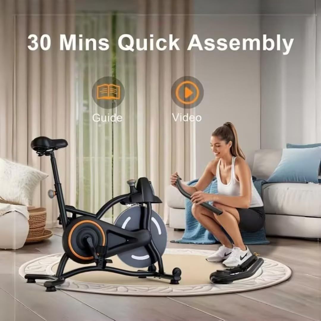 Black indoor cycling bike with quick-assembly guide styling and adjustable seat post.