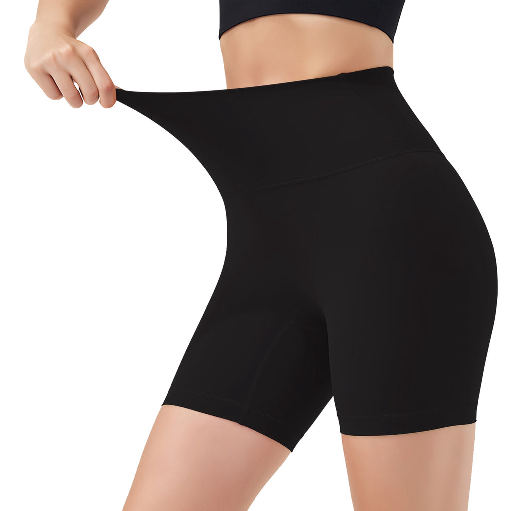 Black high-waist biker shorts with smooth seam details, side view