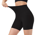 Black high-waist biker shorts with smooth seam details, side view