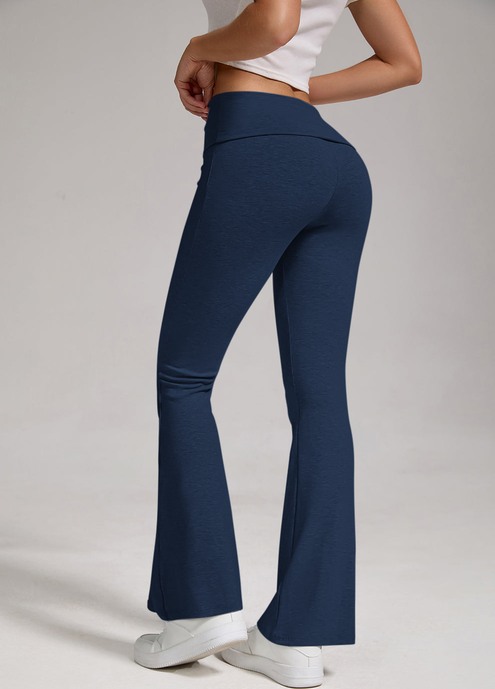 Navy blue fold-over high-rise yoga pants with wide bell flare