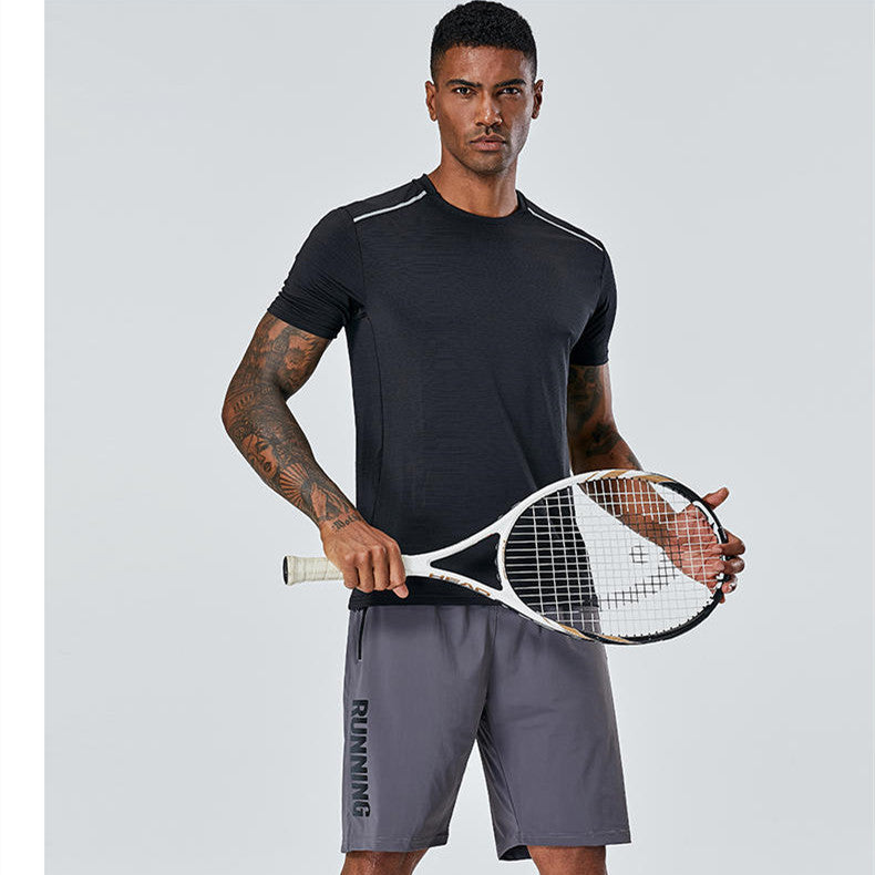Gray quick-dry running shorts with elastic waistband and drawstring, vertical side logo.