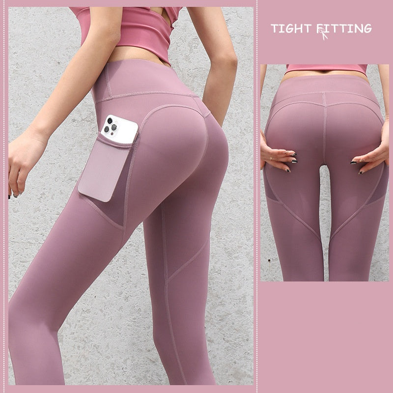 High-waist seamless leggings in mauve with side phone pocket, front view of hips and thighs