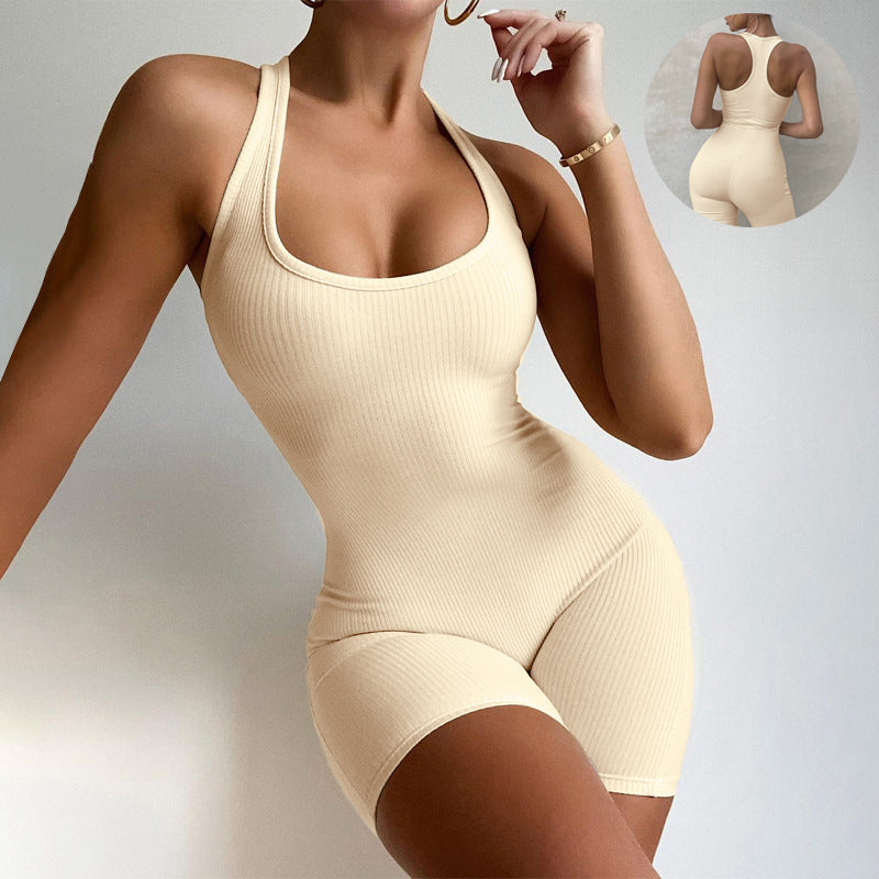 Sleeveless ribbed romper one-piece with scoop neck, high-leg fit in cream color.