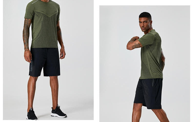Black quick-dry running shorts with elastic waistband, drawstring, and side logo stripe.