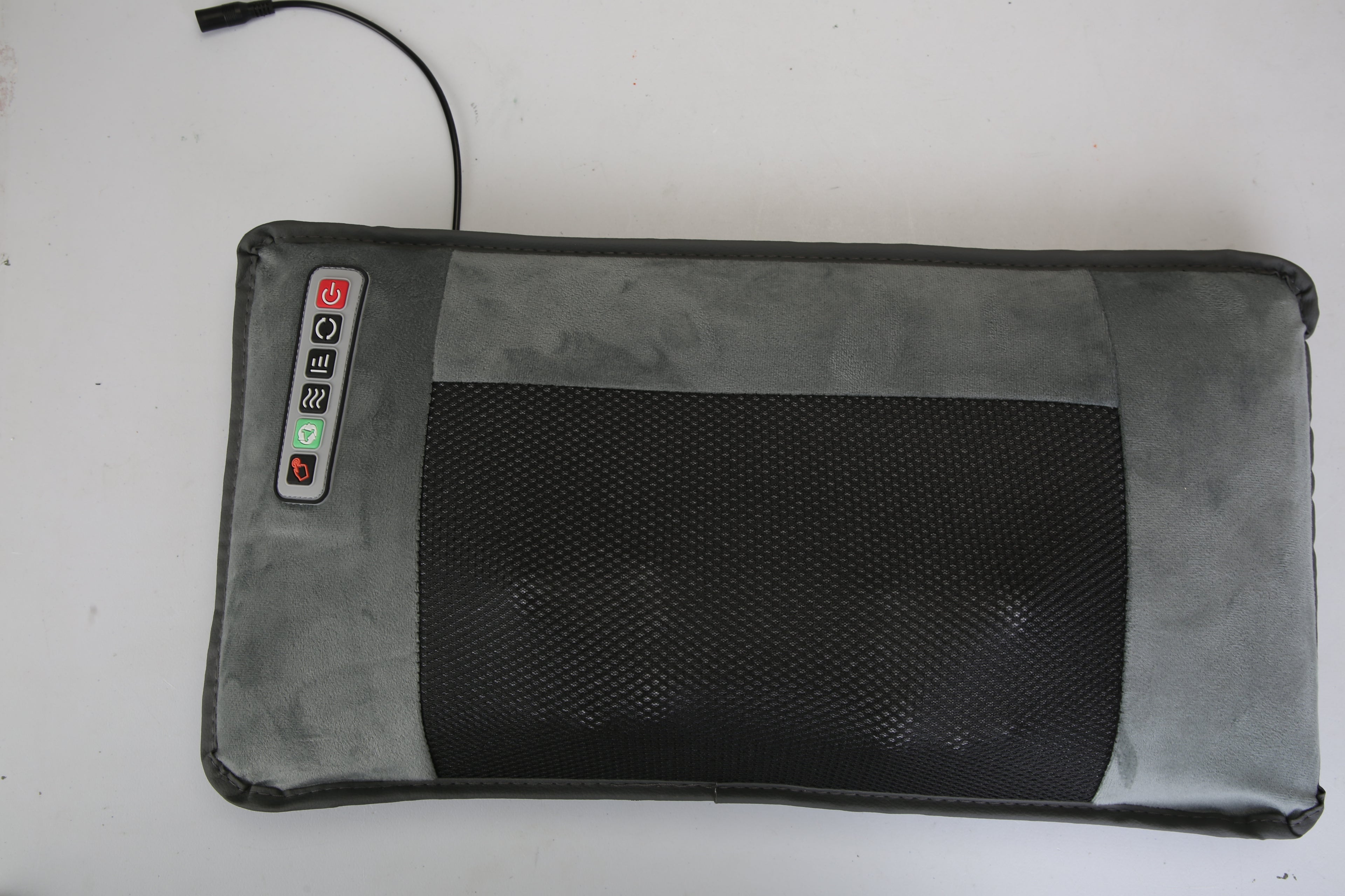 Inflatable lumbar pillow insert with textured black support panel and control port