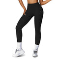 High-waist workout leggings in black, smooth compression fabric with ankle-length legs