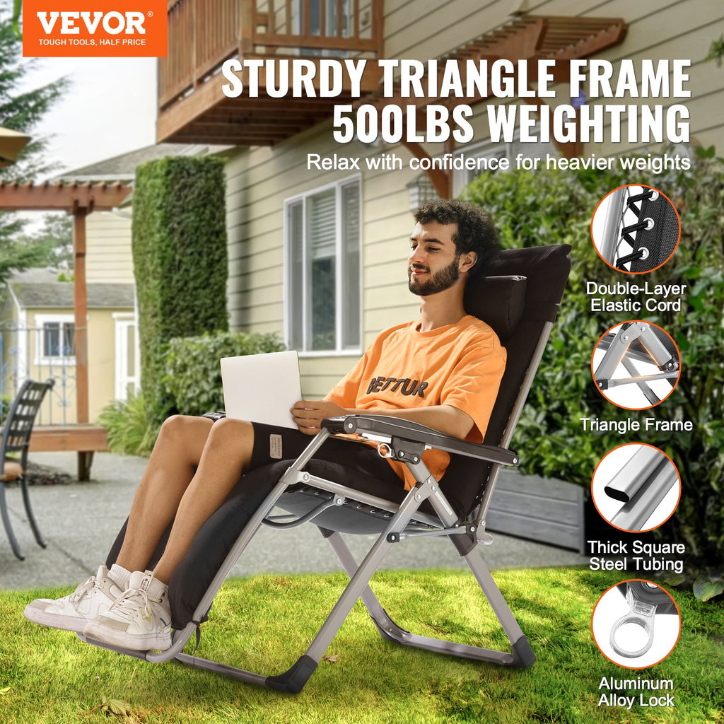 Black padded zero-gravity recliner with thick cushions and triangular steel frame, outdoor view.