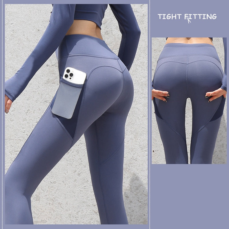High-waist seamless leggings in dusty blue with side phone pocket, front view and rear panel
