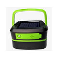Foldable solar camping lantern with solar panel, green control strip, and black carry handle