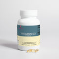 Vitamin D3 2000 IU bottle with cap and a few amber softgels at base