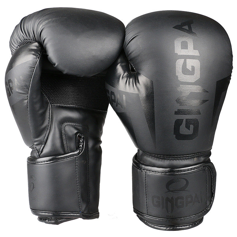 Boxing training gloves in dark gray with subtle logo and black wrist section