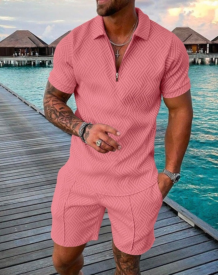 Pink short-sleeve athletic set with zip placket and textured drawstring shorts