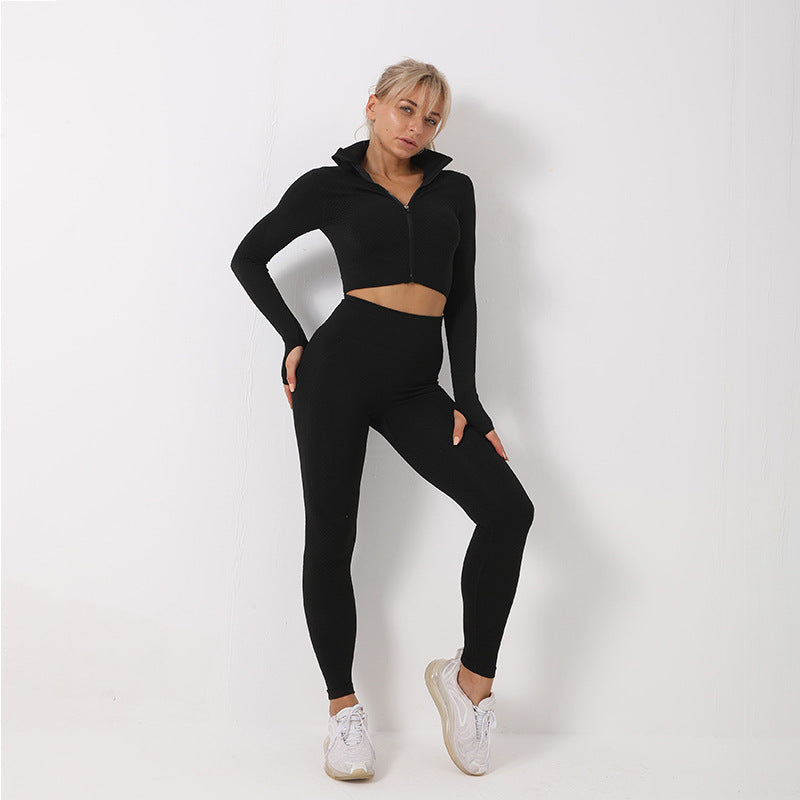 Black seamless zip crop top with matching high-waist leggings and sports bra set