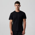 Quick-dry training t-shirt in black, short sleeves, crew neck on model