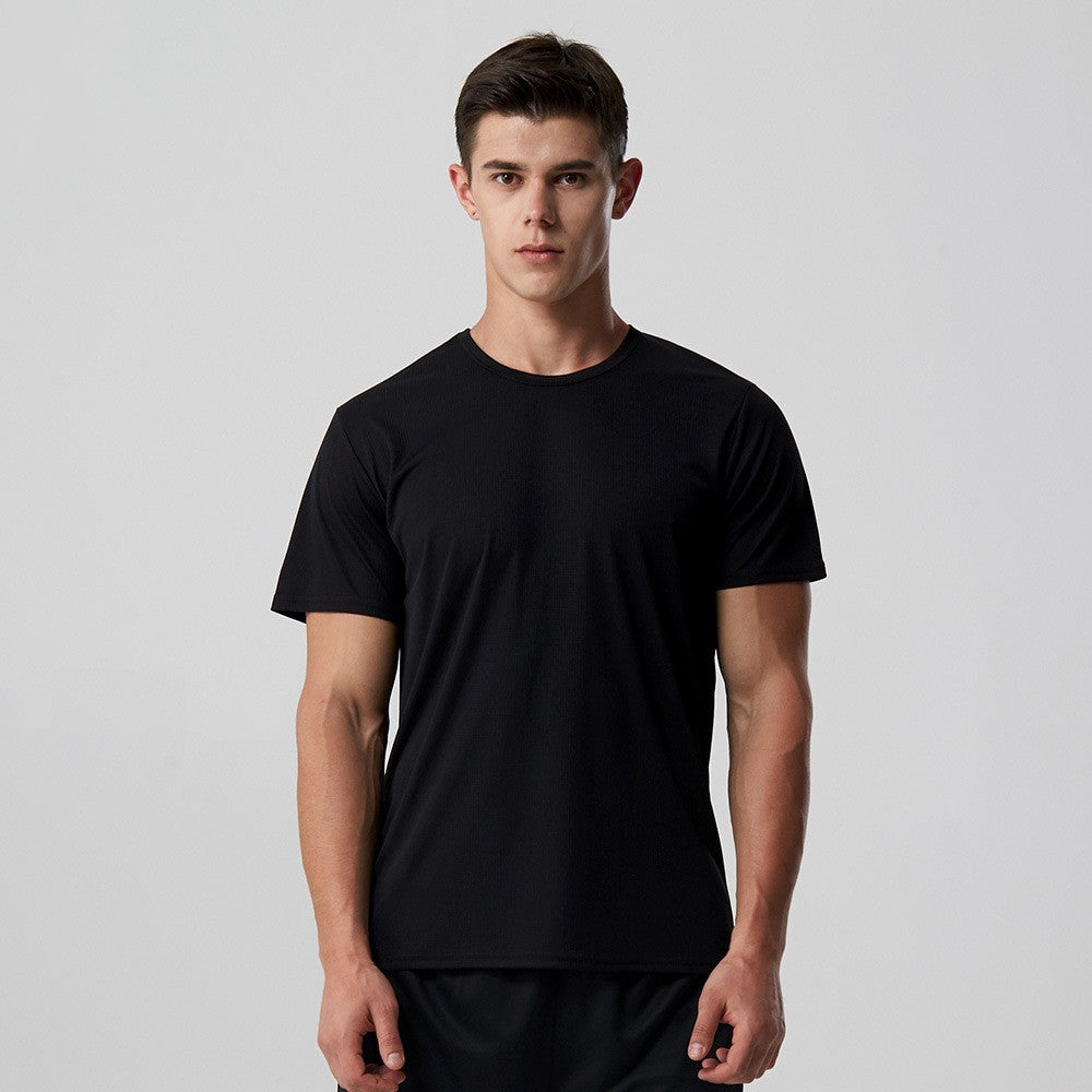 Quick-dry training t-shirt in black, short sleeves, crew neck on model