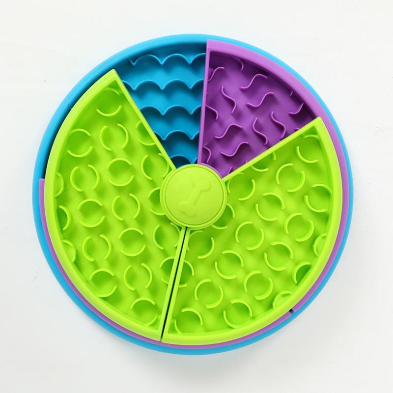 Top view of green interactive dog feeder puzzle bowl with blue and purple sections