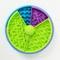 Top view of green interactive dog feeder puzzle bowl with blue and purple sections