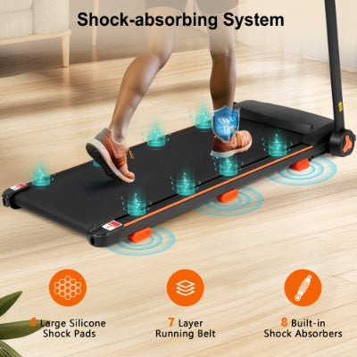 Black treadmill deck with multiple shock-absorbing pads highlighted, woman jogging stance