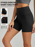 Black high-waist biker shorts with side pockets and body-hugging fit
