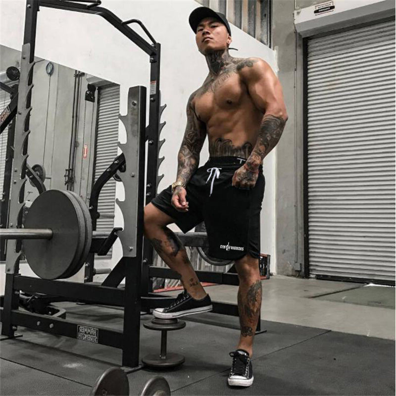 Men's quick-dry mesh fitness shorts in dark black, white drawstring and side logo hem