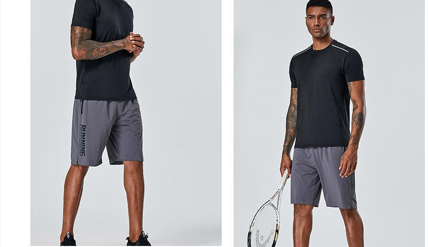 Gray quick-dry running shorts with drawstring elastic waist and side logo panel.