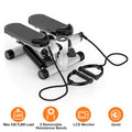 Mini fitness stepper with LCD monitor, black step pads, and resistance bands