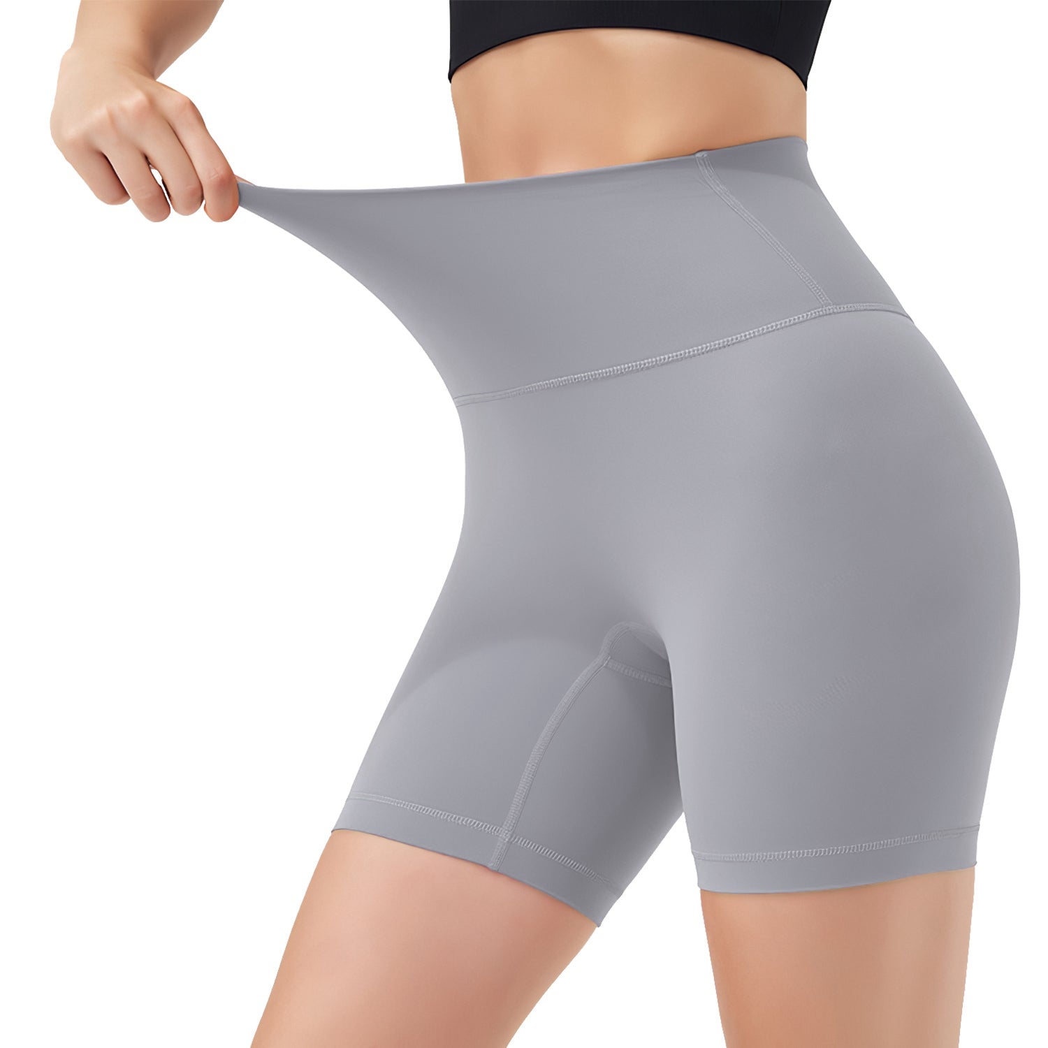 Grey high-waist biker shorts with elastic waistband, side view