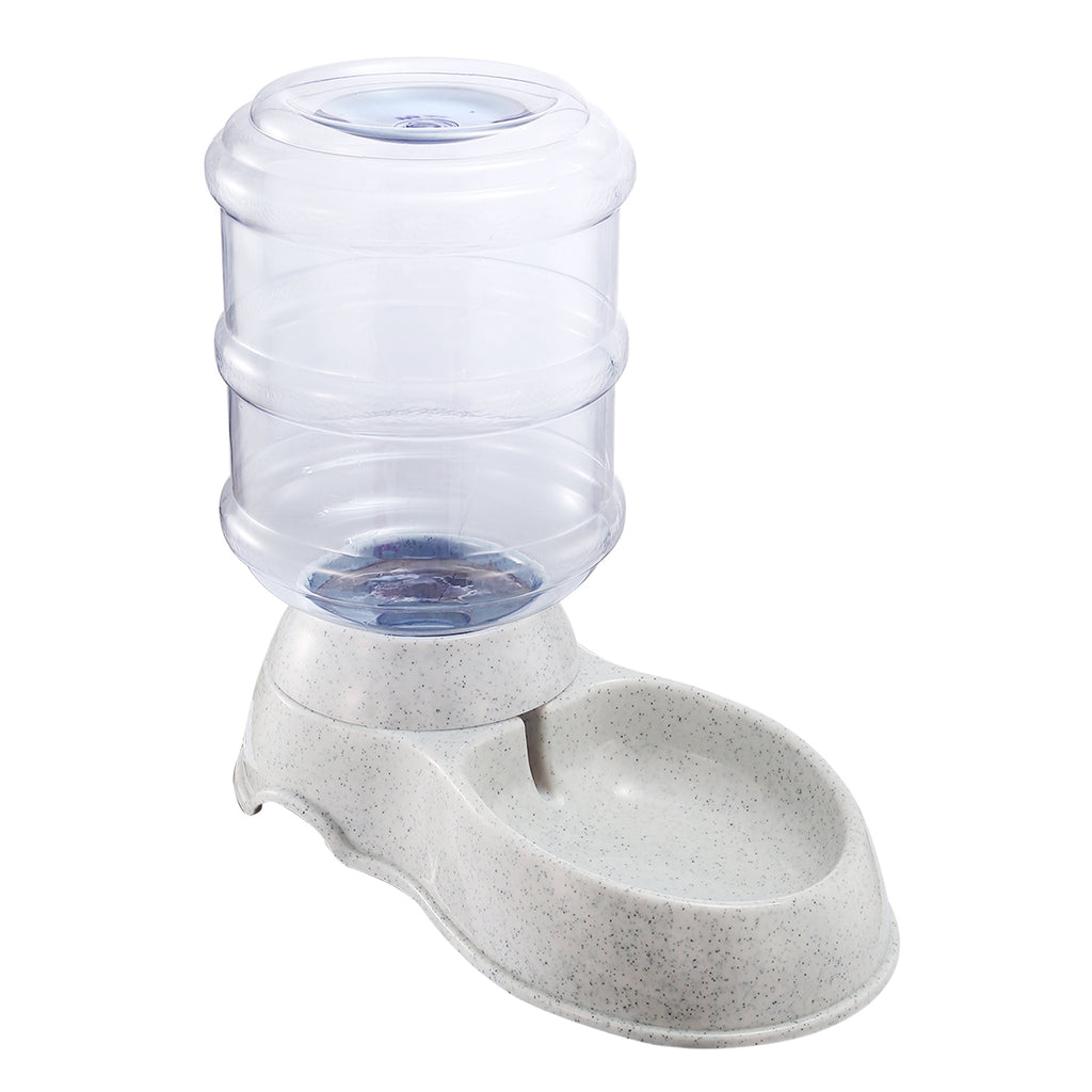Gravity pet water dispenser with clear refill barrel on speckled gray base and front spout