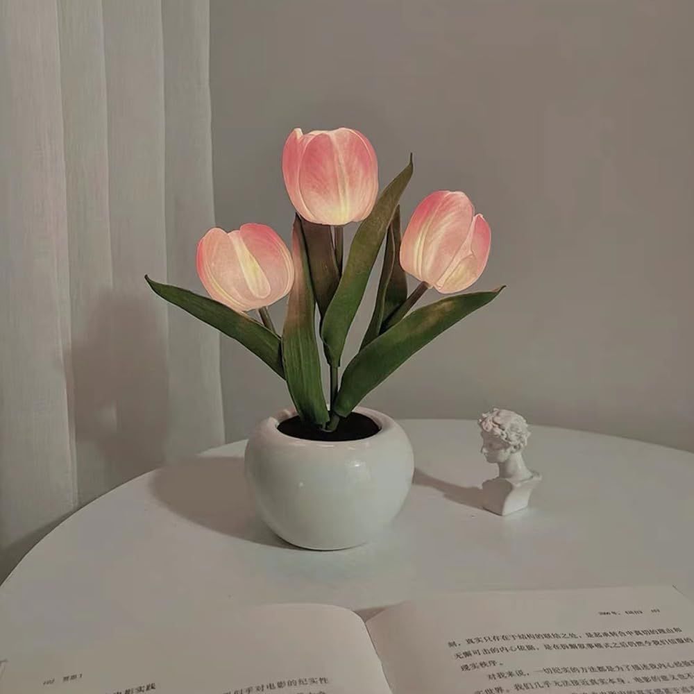LED tulip table lamp with glowing pink petals in a white vase base.