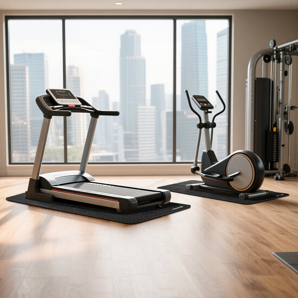 Black foldable treadmill mat with textured non-slip surface, shown under exercise equipment