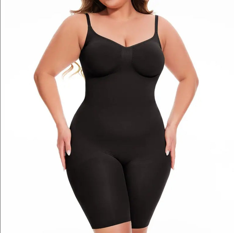 Black seamless tummy-control mid-thigh shaper short, front profile