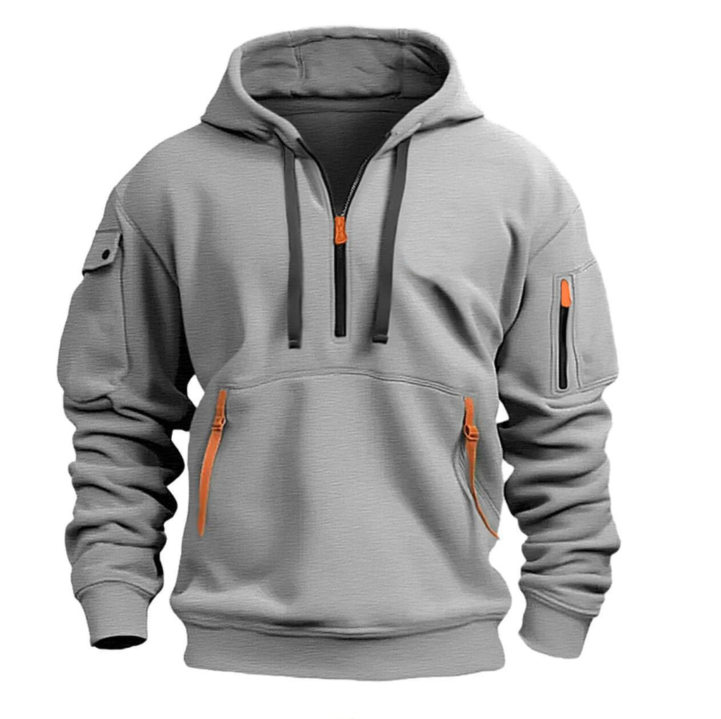 Oversized light gray hoodie with hood, black drawstrings, kangaroo pocket, sleeve zip pockets