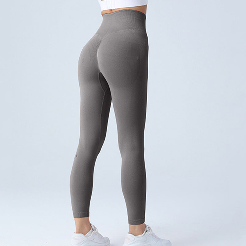 Charcoal high-waist seamless leggings with tummy-control shaping, full-length