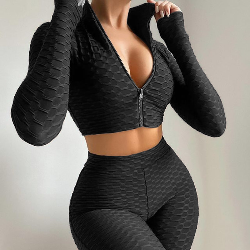 Black long-sleeve zip crop top and matching high-waist shorts tracksuit set