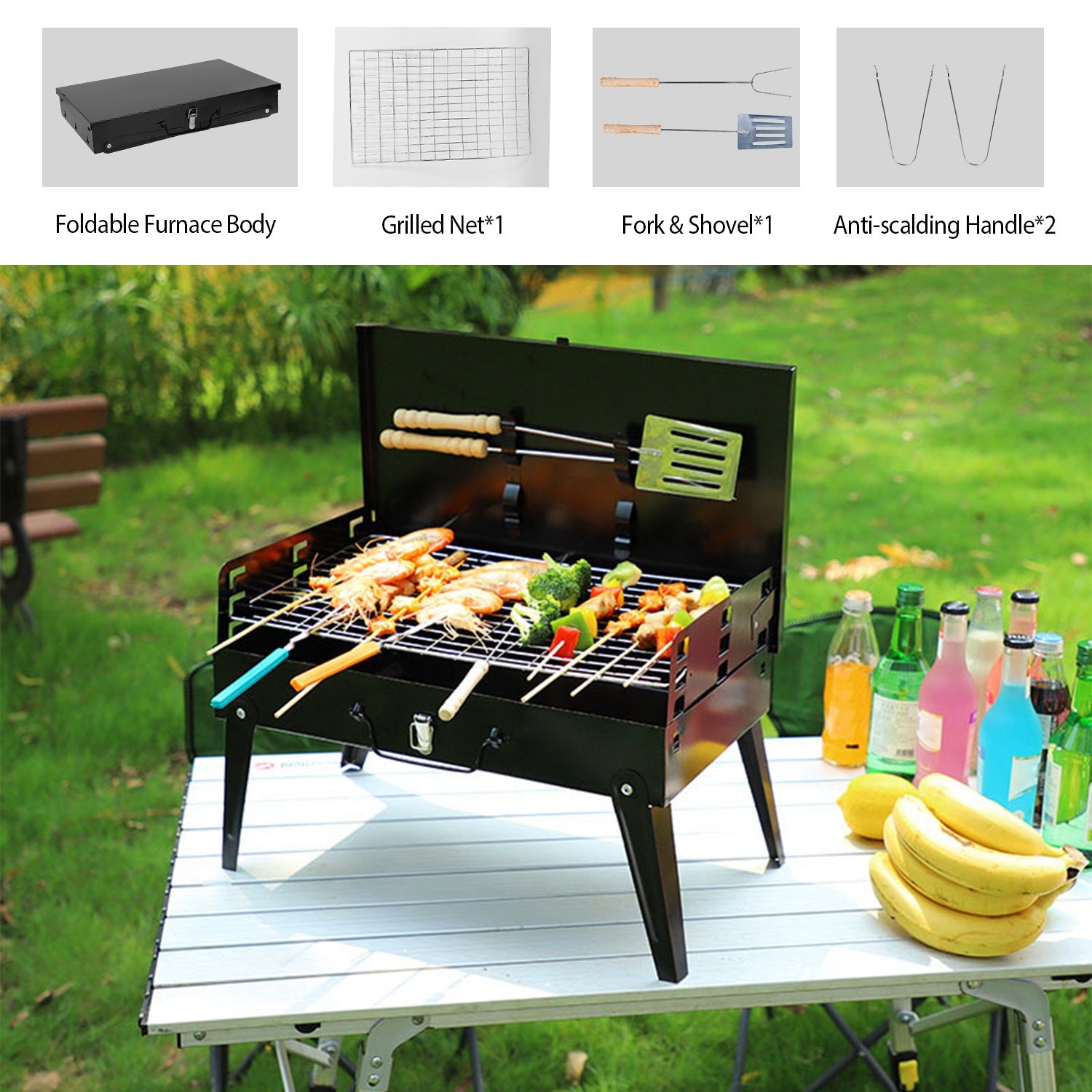 Black BBQ grill on outdoor table with cooking grate and included utensil tools