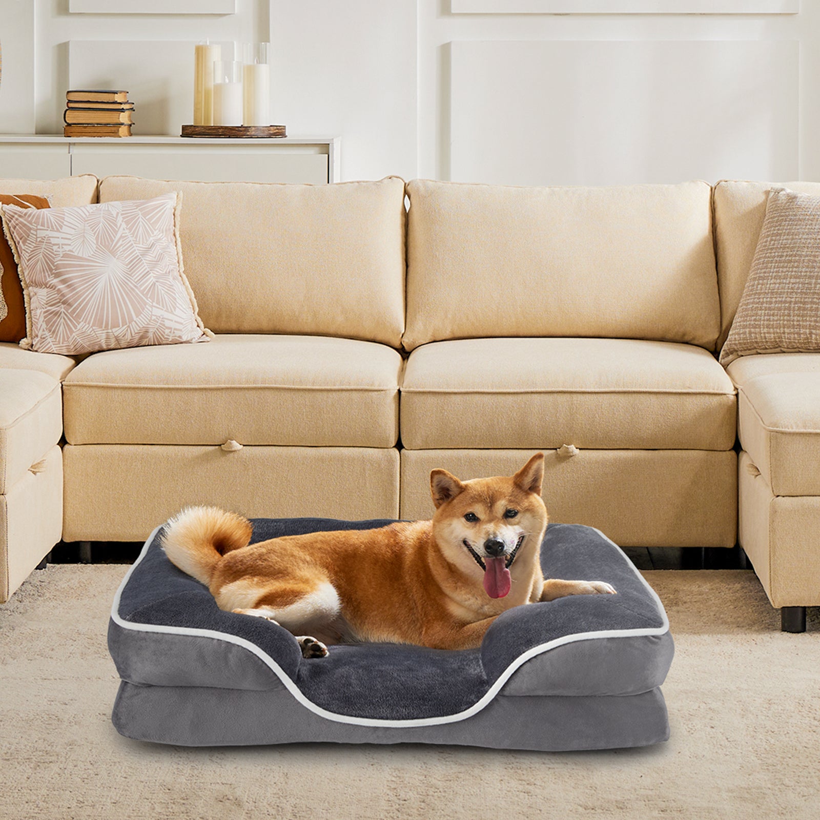 Brown pet bed with grey interior lining and plush cushioned side bolsters