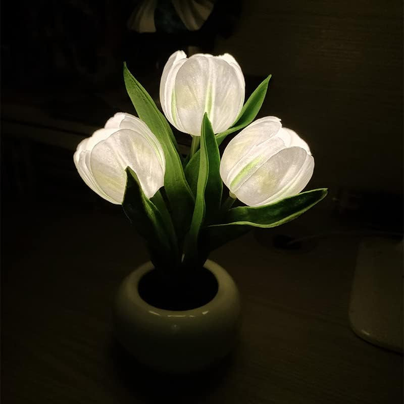 LED tulip table lamp with glowing white tulip petals and green stems in a vase base.