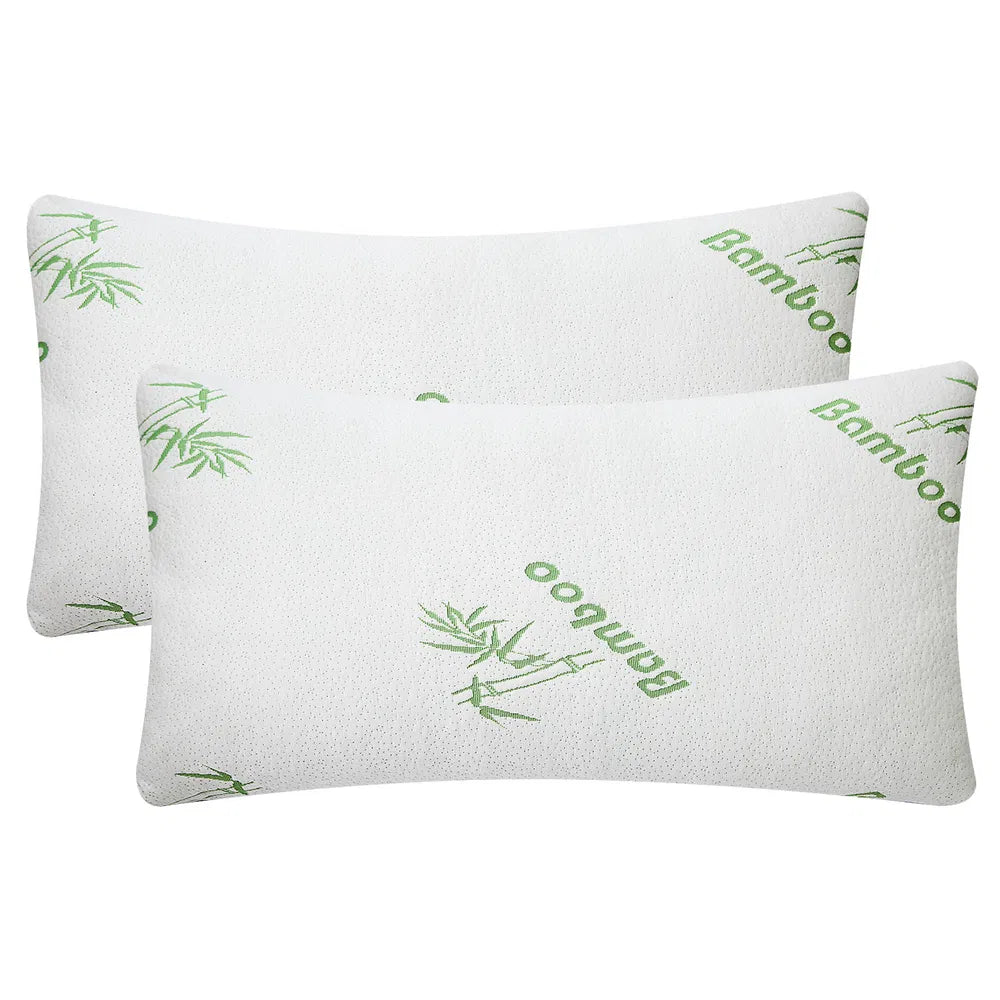 Two bamboo memory foam pillows with white cover and green bamboo logo print