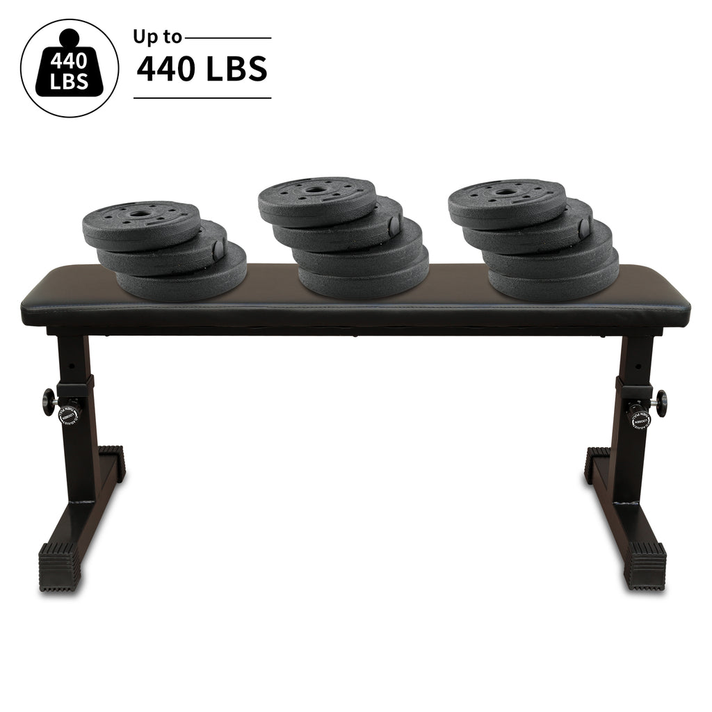 Flat weight bench with dark padded top and three circular weight rests, black.
