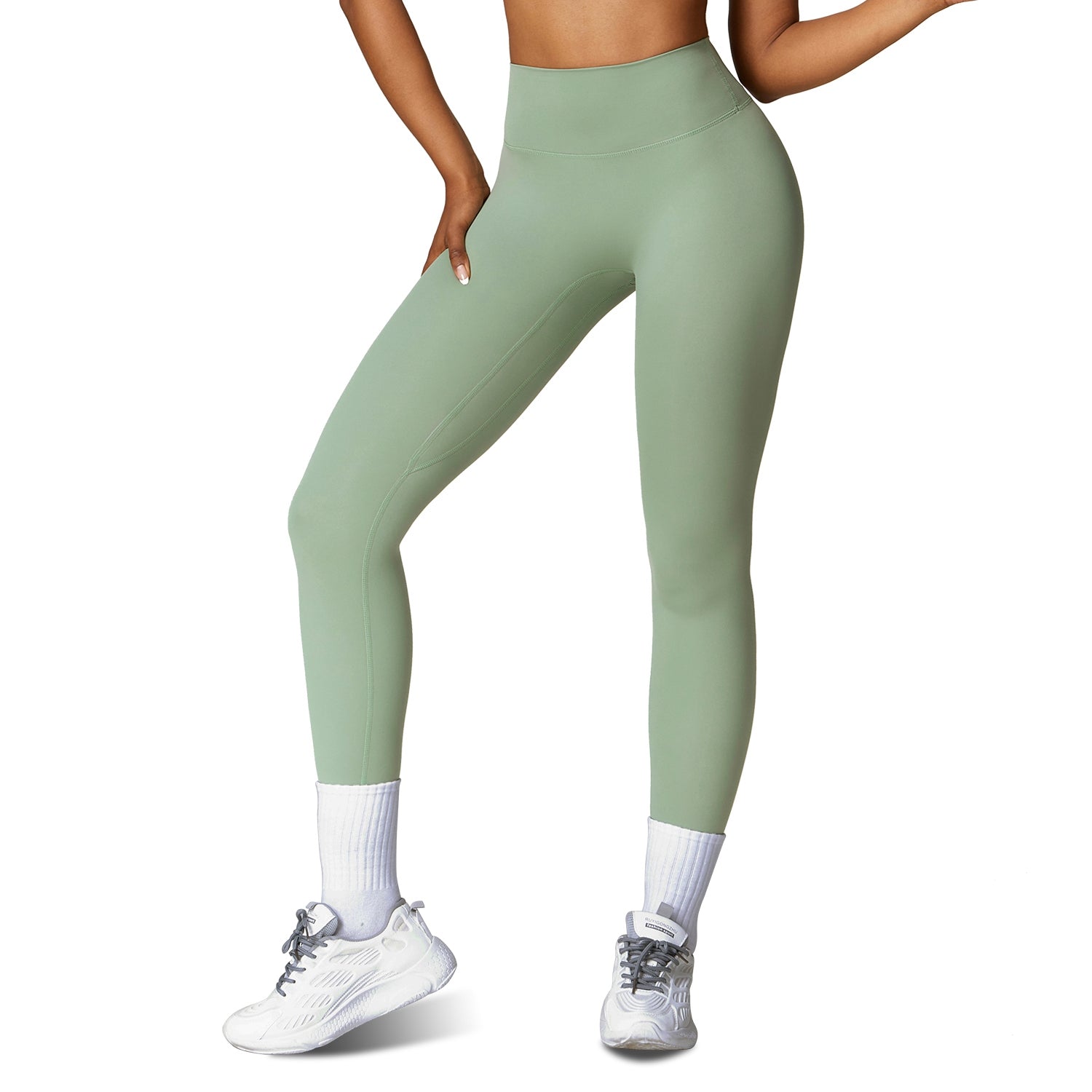 High-waist workout leggings in sage green, streamlined compression fit with ankle length