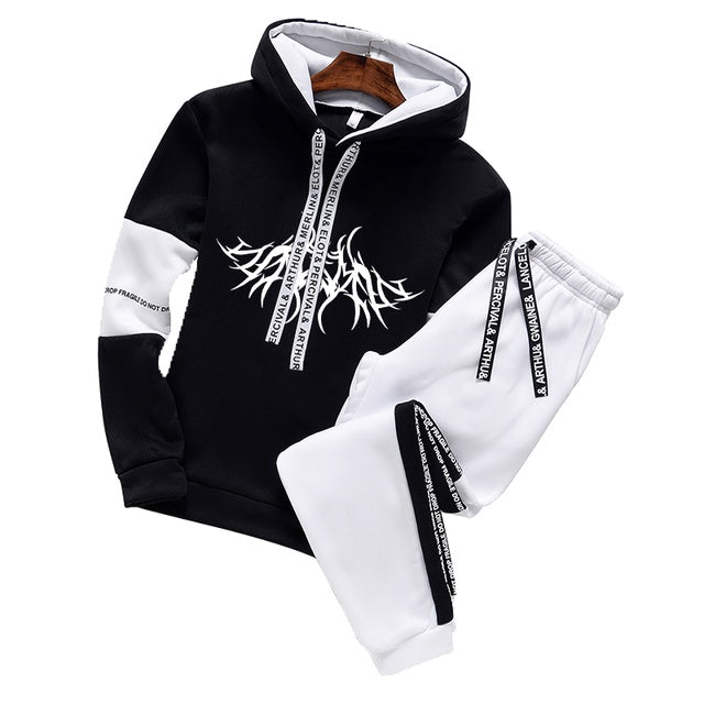 Two-piece hoodie and sweatpants set, black hoodie with white sleeves and white joggers